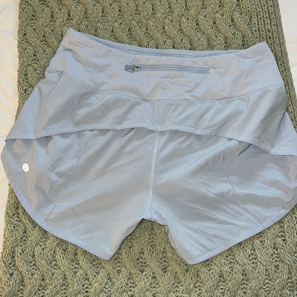 Lululemon blue speed up short. 4’ inseams. Size 6 tall.